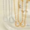 Pavé Horseshoe Pendant Necklace product image 1 Gold-tone pavé horseshoe necklace with 40 cm chain, 5 cm extender and pendant dimensions