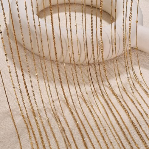Textured Stainless Steel Chain Necklace Collection product image 1 Textured gold-tone stainless steel chain necklaces arranged together