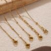 Textured Stainless Steel Chain Necklace Collection product image 3 Close-up of polished and textured gold-tone necklace links