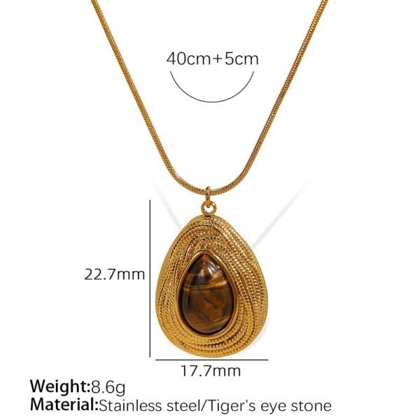 Tiger's eye sculpted pendant necklace dimensions showing 40 cm chain, 5 cm extender, 22.7 mm pendant and 8.6 g weight Tiger's eye sculpted pendant necklace dimensions showing 40 cm chain, 5 cm extender, 22.7 mm pendant and 8.6 g weight