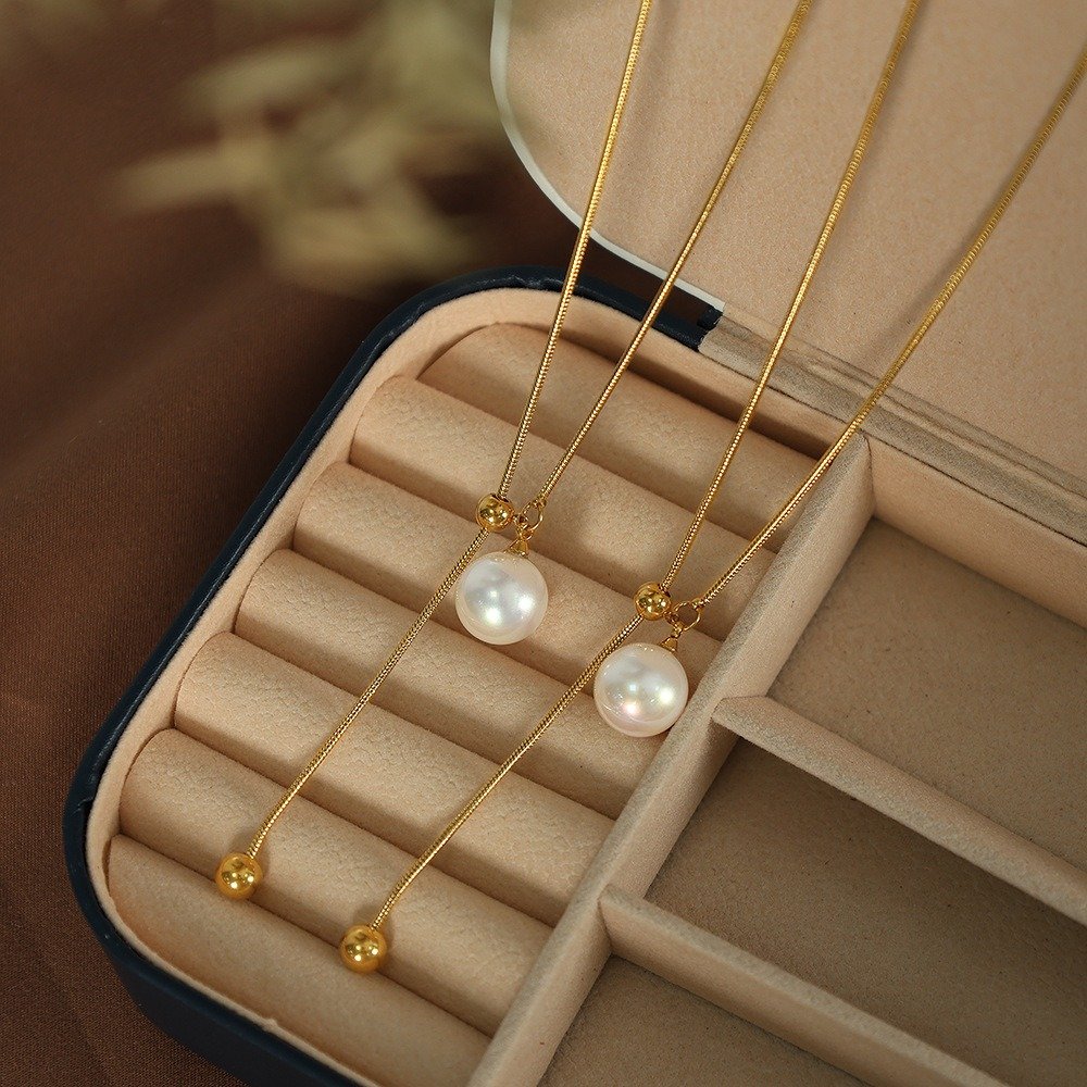 Gold-tone pearl drop adjustable Y necklace