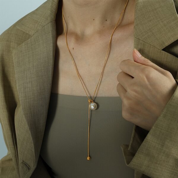 Pearl Drop Adjustable Y Necklace product image 3 Gold-tone and silver-tone pearl drop Y necklace options